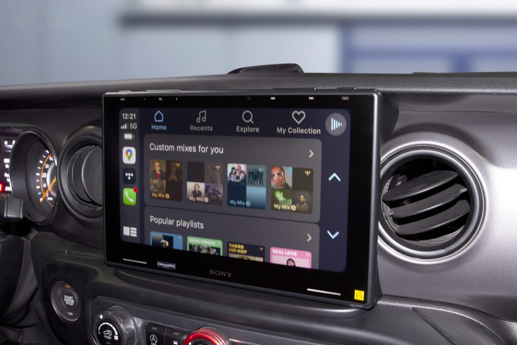 Sony car infotainment system display showing music playlists and options on a touchscreen.