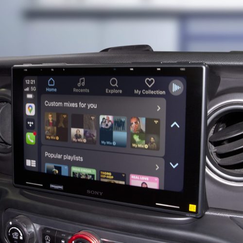 Sony car infotainment system display showing music playlists and options on a touchscreen.