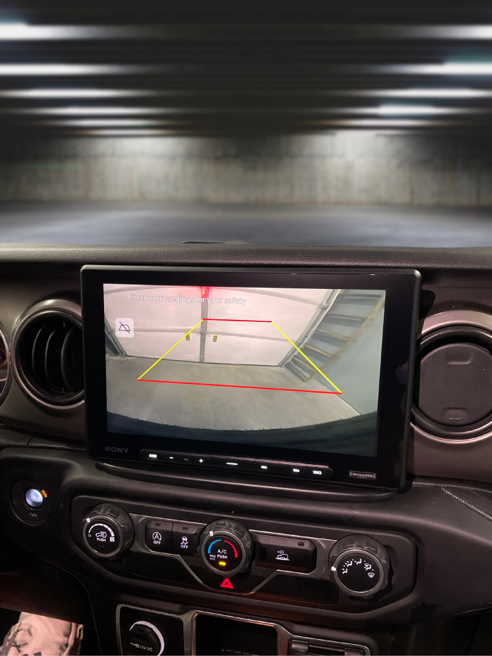 Backup camera display on the Sony XAV-AX8500 multimedia receiver installed in a 2018-2023 Jeep Wrangler JL using the Prolific Audio DIY installation kit.