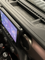 Side profile view of the Sony XAV-AX8500 multimedia receiver installed in a 2018-2023 Jeep Wrangler JL with the Prolific Audio DIY installation kit.