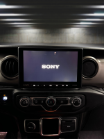 Sony startup screen displayed on the Sony XAV-AX8500 multimedia receiver, installed in a 2018-2023 Jeep Wrangler JL using the Prolific Audio DIY installation kit.