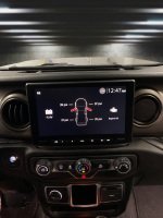 Tire pressure and vehicle status display on the Sony XAV-AX8500 multimedia receiver installed in a 2018-2023 Jeep Wrangler JL using the Prolific Audio DIY installation kit.