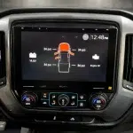 10.1-inch Sony XAV-9500ES touchscreen in a Silverado dash showing 12:48 PM status and PSI indicators on the ES receiver screen