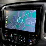 Black Sony XAV-9500ES 10.1" touchscreen in a Silverado shows a detailed navigation map with Lebanon streets and the route position.