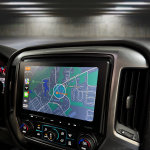 Navigation interface displayed on the Sony XAV-AX8500 multimedia receiver installed in a 2014-2019 Chevrolet Silverado or GMC Sierra, featuring a clear and modern dashboard integration.