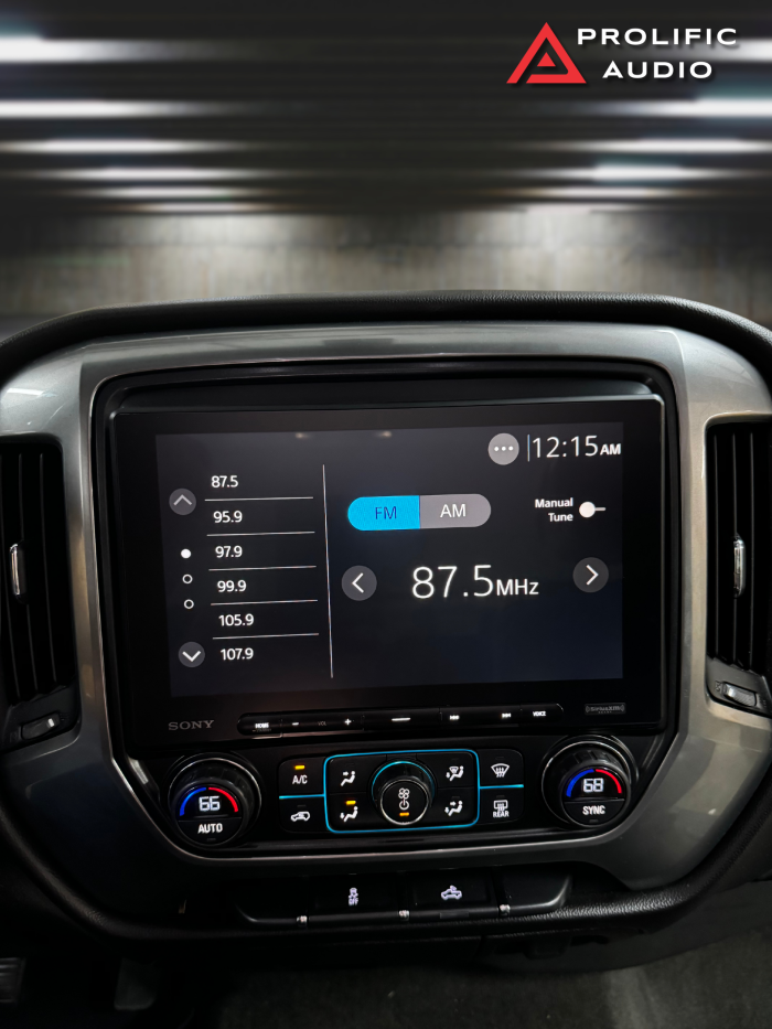 FM radio tuning interface displayed on the Sony XAV-AX8500 multimedia receiver in a 2014-2019 Chevrolet Silverado or GMC Sierra, tuned to 87.5 MHz.