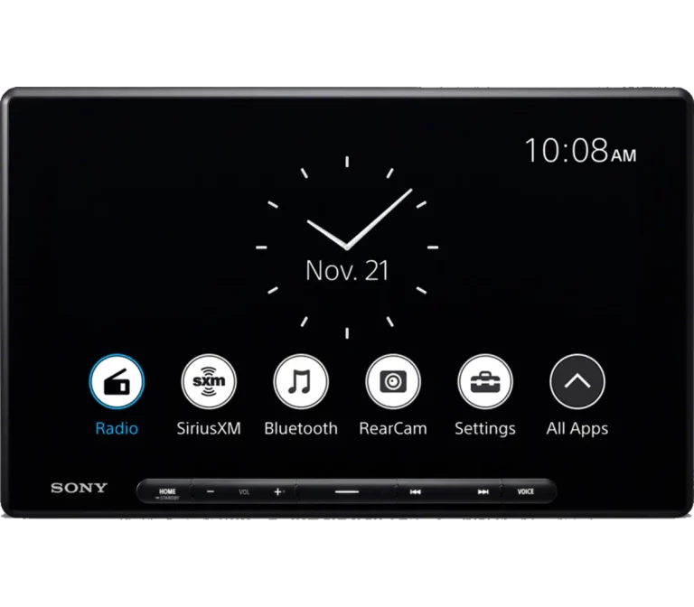 Sony XAV-AX8500 radio display showing a minimalist clock interface with the date November 21 and the time 10:08 AM. Below the clock, icons provide access to features like radio, SiriusXM, Bluetooth, rear camera, settings, and all apps, emphasizing a sleek and user-friendly design.