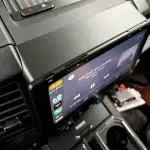 Upgraded Ford F150 dash showing a 10.1-inch Sony XAV-9500ES screen with Wireless Carplay interface on a black panel.