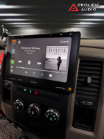 Sony car stereo display showing the song 'Tennessee Whiskey' by Chris Stapleton with album cover in a vehicle interior.