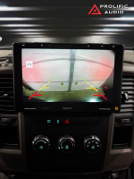 Sony car stereo display showing a rearview camera interface with guidelines for parking assistance.