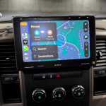 Sony car stereo display showing navigation options and pinned locations for home and work.