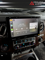 Sony car stereo displaying the song 'Little Talks' by Of Monsters And Men in a vehicle interior.