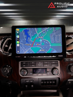 Sony car stereo display showing a navigation map with route information in a vehicle interior.