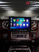 Sony car stereo display with various app icons including music, navigation, and phone features.