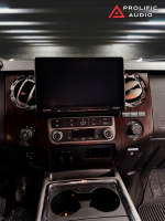Dashboard of a vehicle featuring a Sony touchscreen display and control panel with various buttons.